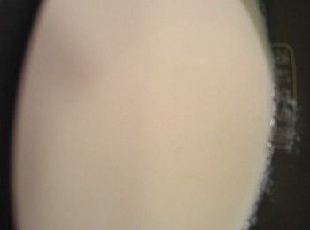 step9: 打開蓋後豆漿巳凝固成豆腐花。