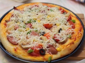 step10: 10.     灑上芝士，再放回焗爐焗5分鐘即成。