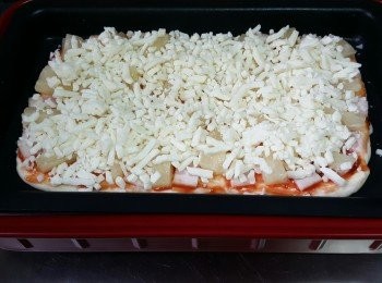 step7: 將平烤盆放上，日式電熱鍋較2度火力，關蓋焗5分鐘