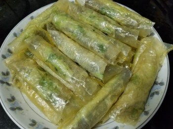 step6: 用腐皮將九吐魚包卷好