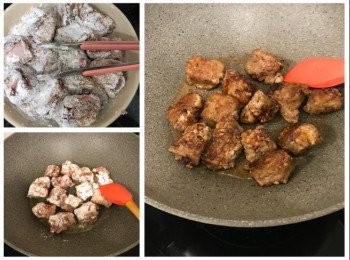 step3: 用5湯匙油燒熱鑊，豬肋骨撲上生粉，以中火將豬肋骨煎4分鐘，反轉再煎4分鐘之後畧為兜炒至金黃色，盛起