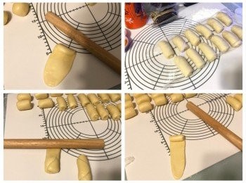 step7: 將包好的麵糰用手稍微壓一下，桿開成橢圓形薄片，捲起形成圓柱形狀，收口朝下，用保鮮紙蓋著，靜置15分鐘；
將圓柱形麵團收口朝上，用手壓平，桿開成長形，捲起形成圓柱形狀，收口朝下，用保鮮紙蓋著，靜置15分鐘
