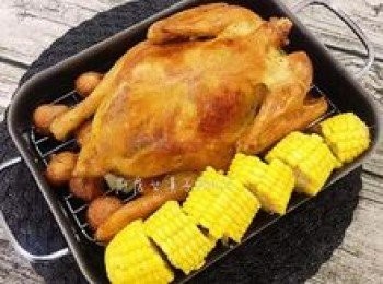 step16: 烤好後再次抹點蒜味香草油在雞上，防止乾掉，接著將甜玉米擺放在烤雞旁即可。