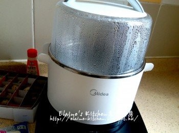 step5: 蓋上蓋按<蒸 / 煮>功能  , 時間調至15分鐘煮至鵪鶉蛋熟透