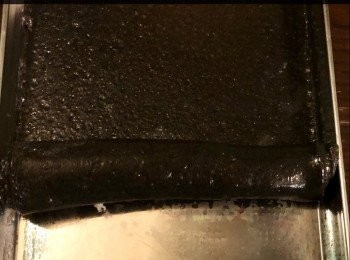 step6: 蒸好後取出長方形模放涼後， 先將成塊皮弄鬆拿起， 慢慢捲成卷狀。