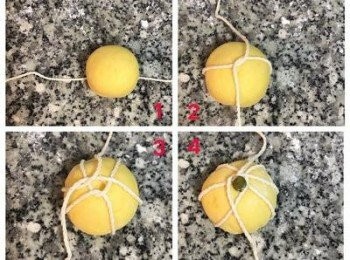 step15: 將南瓜包子放在棉繩的中間，以米字型捆綁，不要綁太緊鬆鬆地即可，最後一次捆綁時用筷子避開繩子，在中間壓一下，把南瓜梗沾點水壓入凹槽，最後再從底部把繩子綁活結。（綁太緊會讓蒸好後的包子很難脫繩喔～）