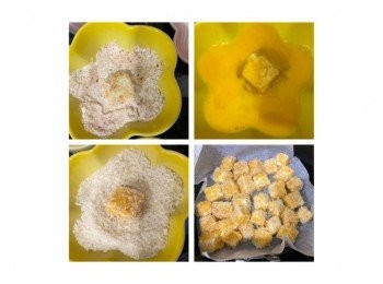 step3: 180度預熱氣炸鍋5分鐘，
放牛油紙在煎盤上，噴油，順序將豆腐粒沾上生粉鹽、蛋液及麵包糠，排放在煎盤上