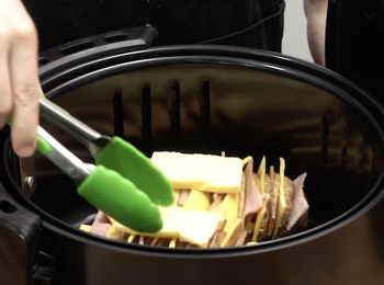 step8: 放一大塊牛油於薯仔表面 Pull out the tray put a large scoop of butter on top.