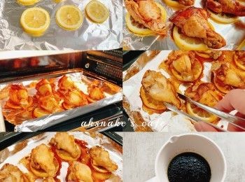 step2: 焗盤鋪上檸檬片，放上雞槌。放入焗爐200度先焗12分鐘，掃蜜糖，再焗3-5分鐘至金黃色