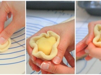 step14: 休息完成的<span class="group_2">油皮</span>油酥麵團收口朝上，用大拇指從中間壓下，2端往中間折起捏一下，將麵糰壓扁。