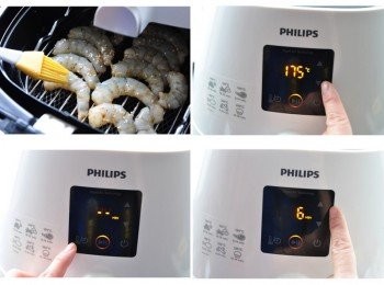 step3: 在醃過的蝦子上刷上薄薄的橄欖油(防止蝦子不會過乾)，接著放入飛利浦健康氣炸鍋-串燒雙層架上，放進炸籃再推進氣炸鍋內 ，按下右下角圓形開關鍵，選擇溫度175度，再輕按功能鍵時間選擇6分鐘，進行氣炸烹調