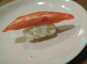 step7: 蟹味棒放上米飯