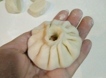 step9: 捏緊收口，都包好之後，全部蓋上保鮮膜醒發15分鐘