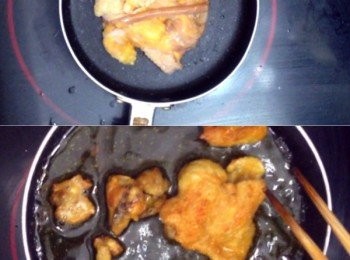 step9: 雞隻風乾的時候需要把之前留用的雞肥膏用白鑊小火慢慢把油炸出來，炸至肥膏又脆又乾後，夾起不要，留起雞油備用