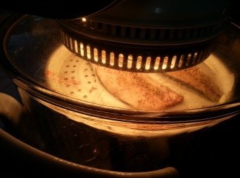 step4: 光波爐預熱200c3分鐘,用高架,將魚放在牛油紙上,先波8-10分鐘,反轉再波6-8分鐘