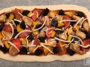 step7: 塗上照燒汁，平均地放入饀料，最後加上芝士