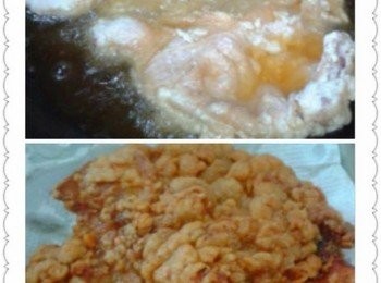 step3: 取出锅加入適量的食油，待油热了把腌製好的雞腿下锅油炸至金黃色捞起待凉了切块待用。