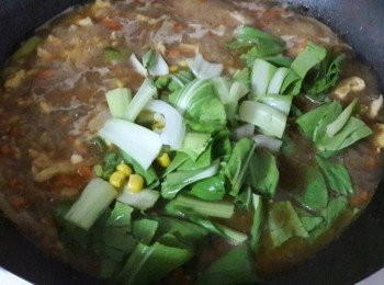 step8: 把青江菜加入拌煮