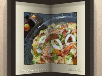 step4: 加入魷魚煮3分鐘...... 拌入麻油和紅辣椒片兜勻...... 撒葱花即可!