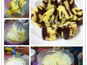 step1: 將奶油和細糖打至鬆軟沒糖粒~
逐粒蛋加入攪拌均勻。
然後加入中筋麵粉，椰漿粉， 打泡粉，牛奶攪拌攪勻。
攪勻后分成2碗，1碗加上可可色素。另1碗原裝奶油色。