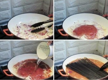 step2: 準備一適合鍋具，加入少許食用油，將洋蔥ˊ蒜瓣擺入，炒至香軟 接著加入茄汁義大利麵醬，添入高湯開水，並擺入墨魚義大利麵